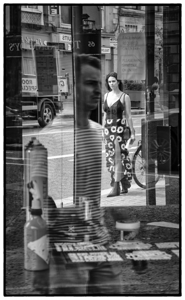 A241 Reflections in a barber shop window.