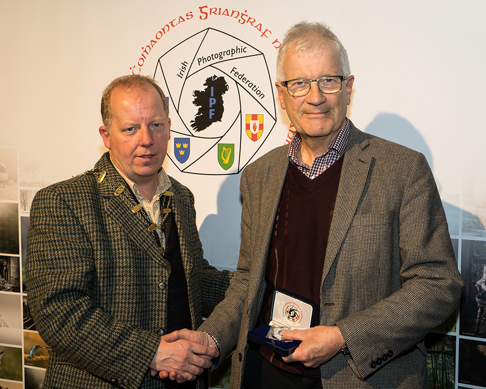 Dominic Reddin, FIPF presenting the Silver Medal to Pat Collins