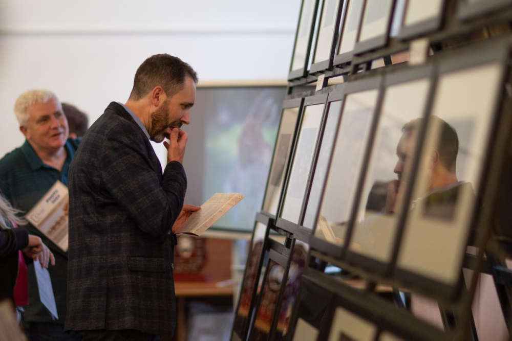 Gary Caby examining the images closely.